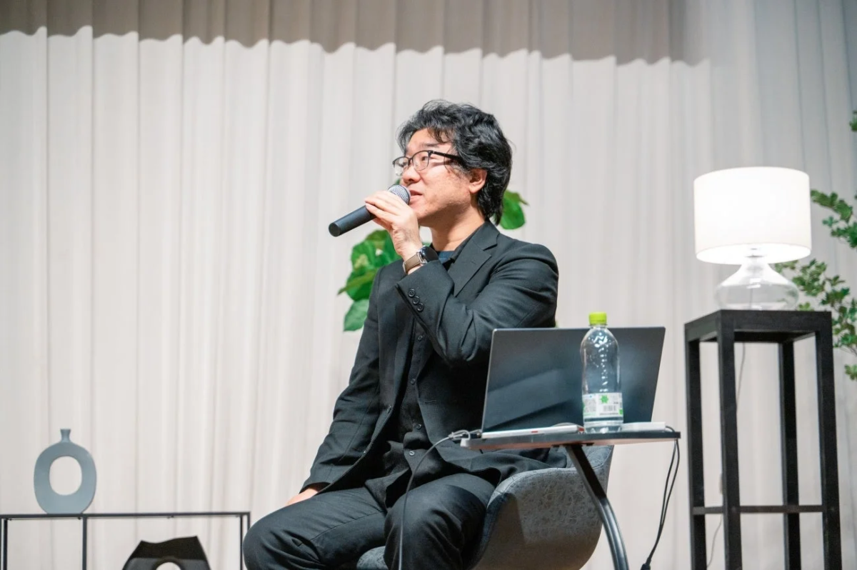 吉崎航氏の講演風景