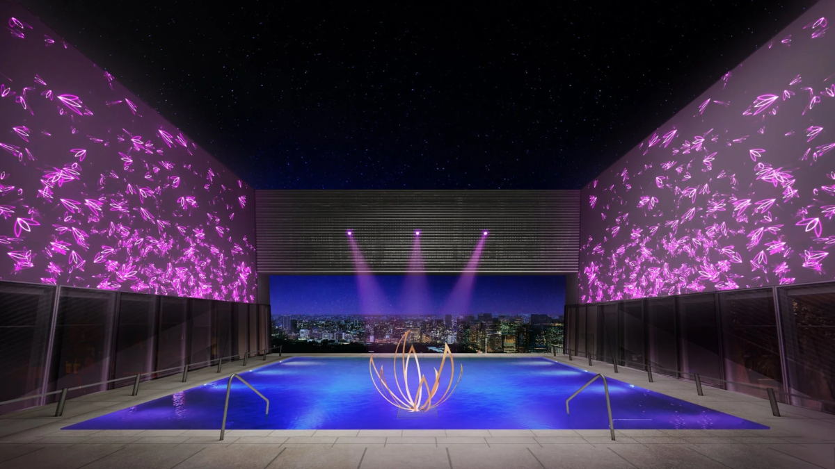 水面に浮かぶ金色の蓮のオブジェ