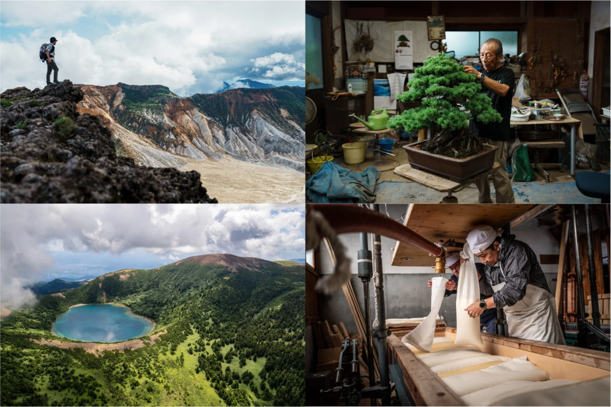 山頂で景色を眺める登山者