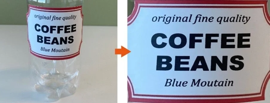 「original fine quality COFFEE BEANS Blue Moutain」と書かれたラベルが貼られた透明な容器が写っています。