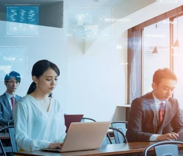 テクノロジーとビジネスの融合を示唆するオフィス風景